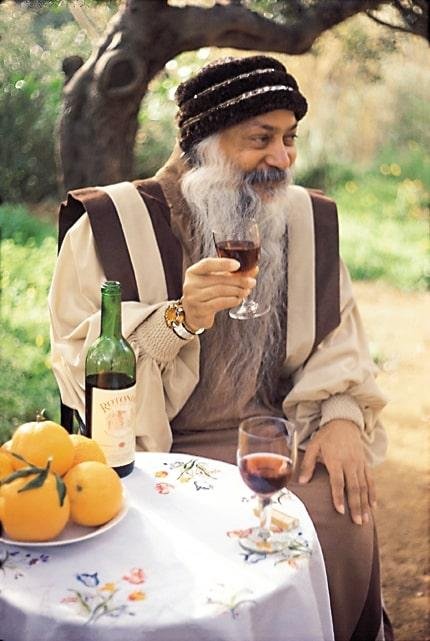Osho with red whine and oranges
