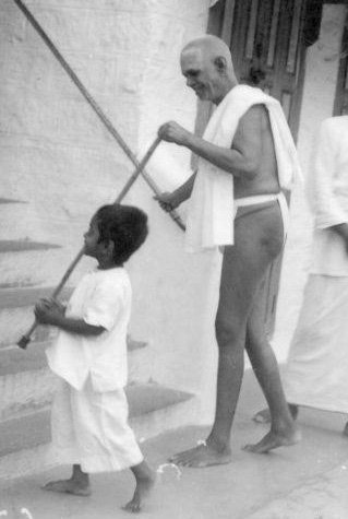 Ramana with Boy and Stick